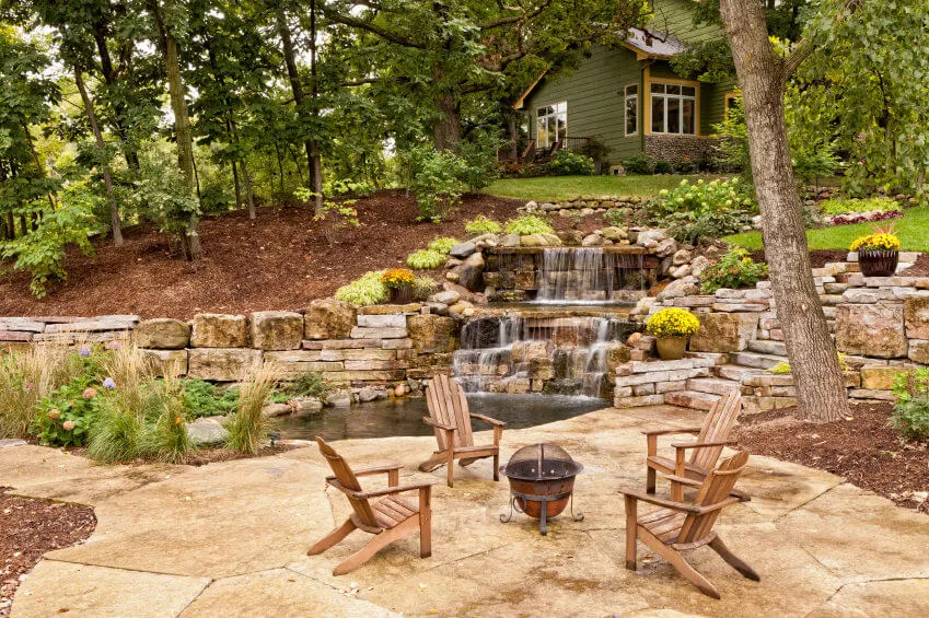 The owner of this cabin seems to have decided to bring nature closer to home by using landscaped rocks and stones to create man-made mini waterfalls There’s stoned pavement that leads from the cabin to the backyard garden where you can enjoy an outdoor picnic with family and friends while enjoying the view
